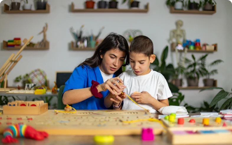 Creative activity session with teacher and student