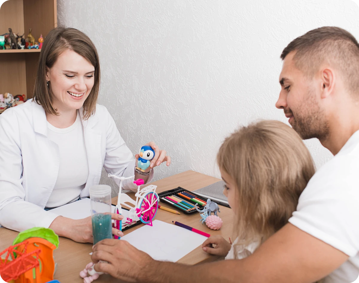Family therapy session with toys